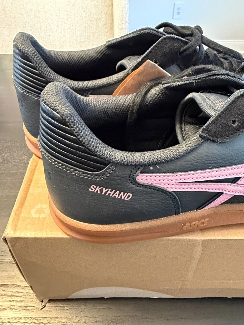 ASICS Skyhand Black Sneakers with Pink Stripes